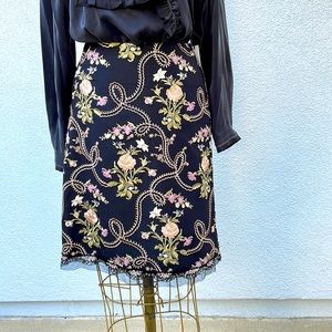 Beautiful lined embroidery skirt by Express with lace and sequined trim at hem